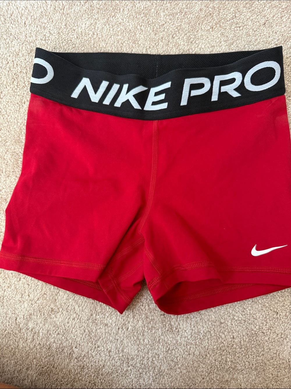 Nike Pro Women's Red Athletic Bike Shorts with Black Branded Waistband